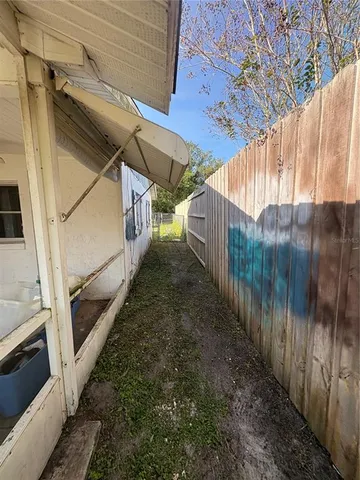 a backyard of a house with seating space