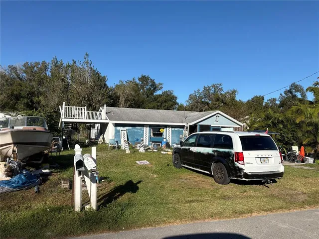 a car parked in front of a house