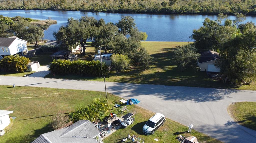 10162 Southwest Riverview Circle Arcadia, FL 34269 - Photo 8 of 21 a view of a lake with a floor to a house