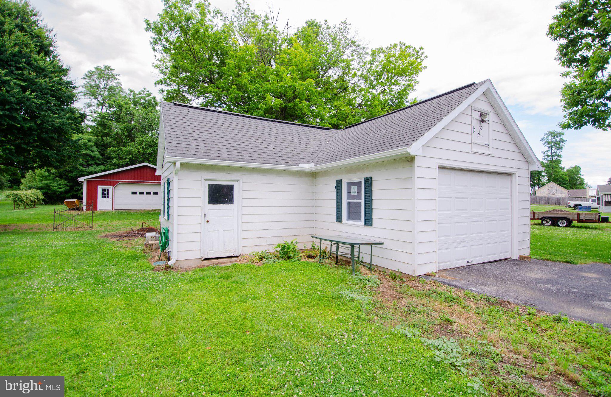 2615 Walnut Bottom Road Carlisle, PA 17015 - Photo 33 of 38 Charming home with lush green surroundings.