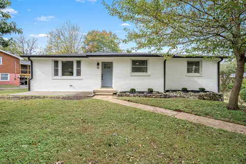 a front view of house with yard