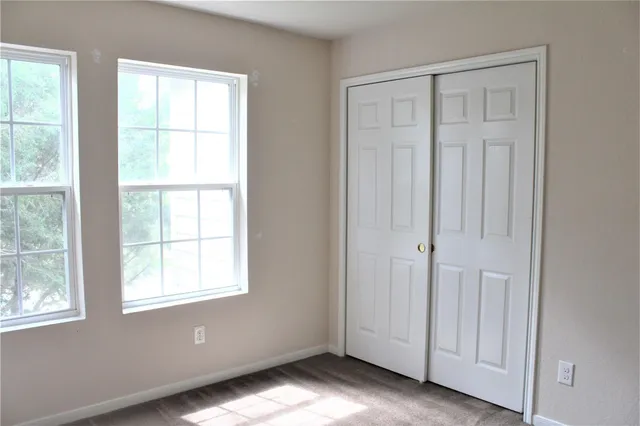 an empty room with window