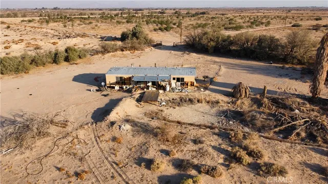 an aerial view of beach and ocean