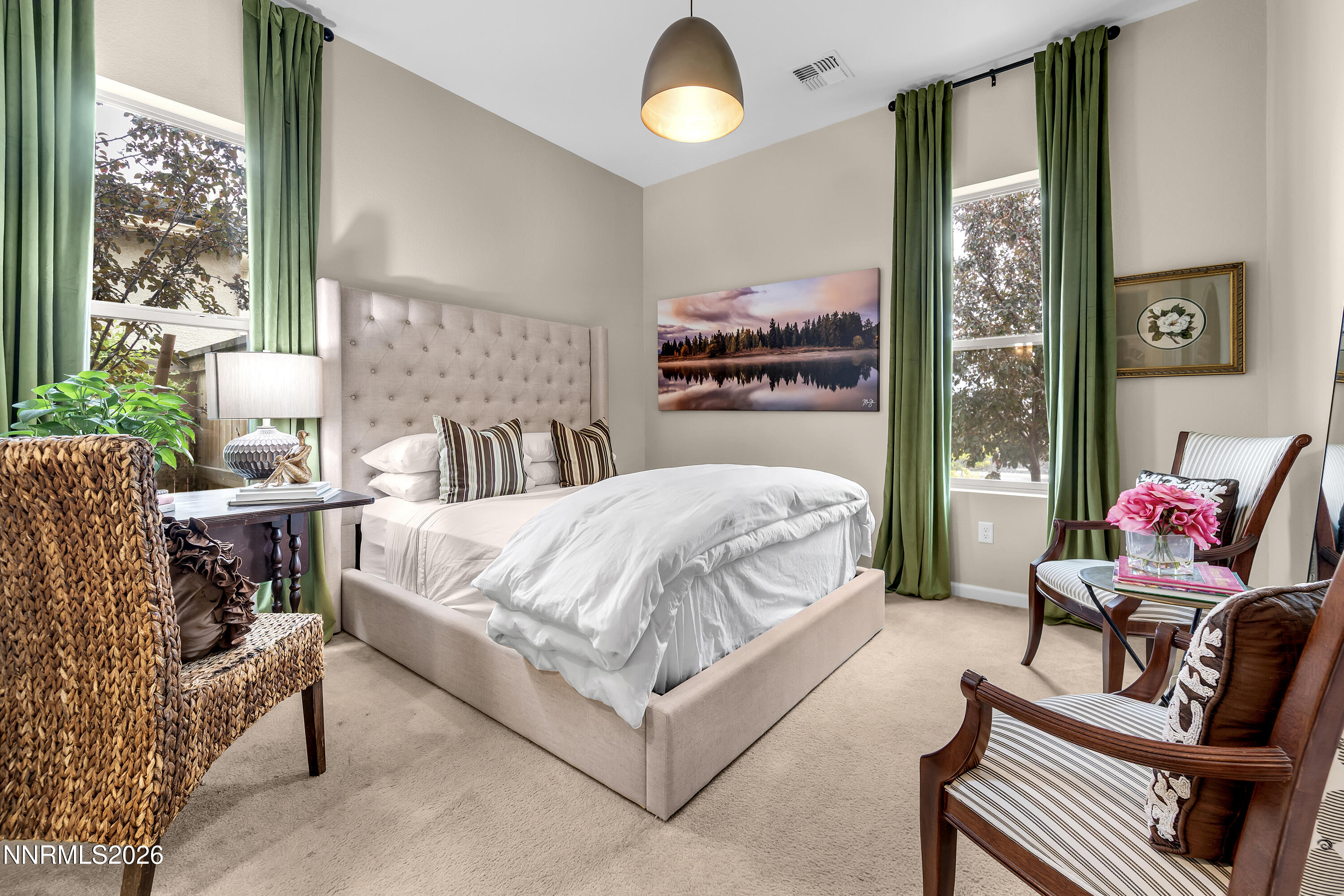 9021 Iron Sky Court Reno, NV 89523 - Photo 18 of 39 a bed room with a bed and a chair