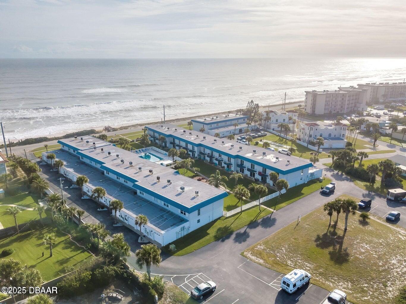 2750 Ocean Shore Boulevard, Unit 19 Ormond Beach, FL 32176 - Photo 1 of 23 a view of a city with an ocean