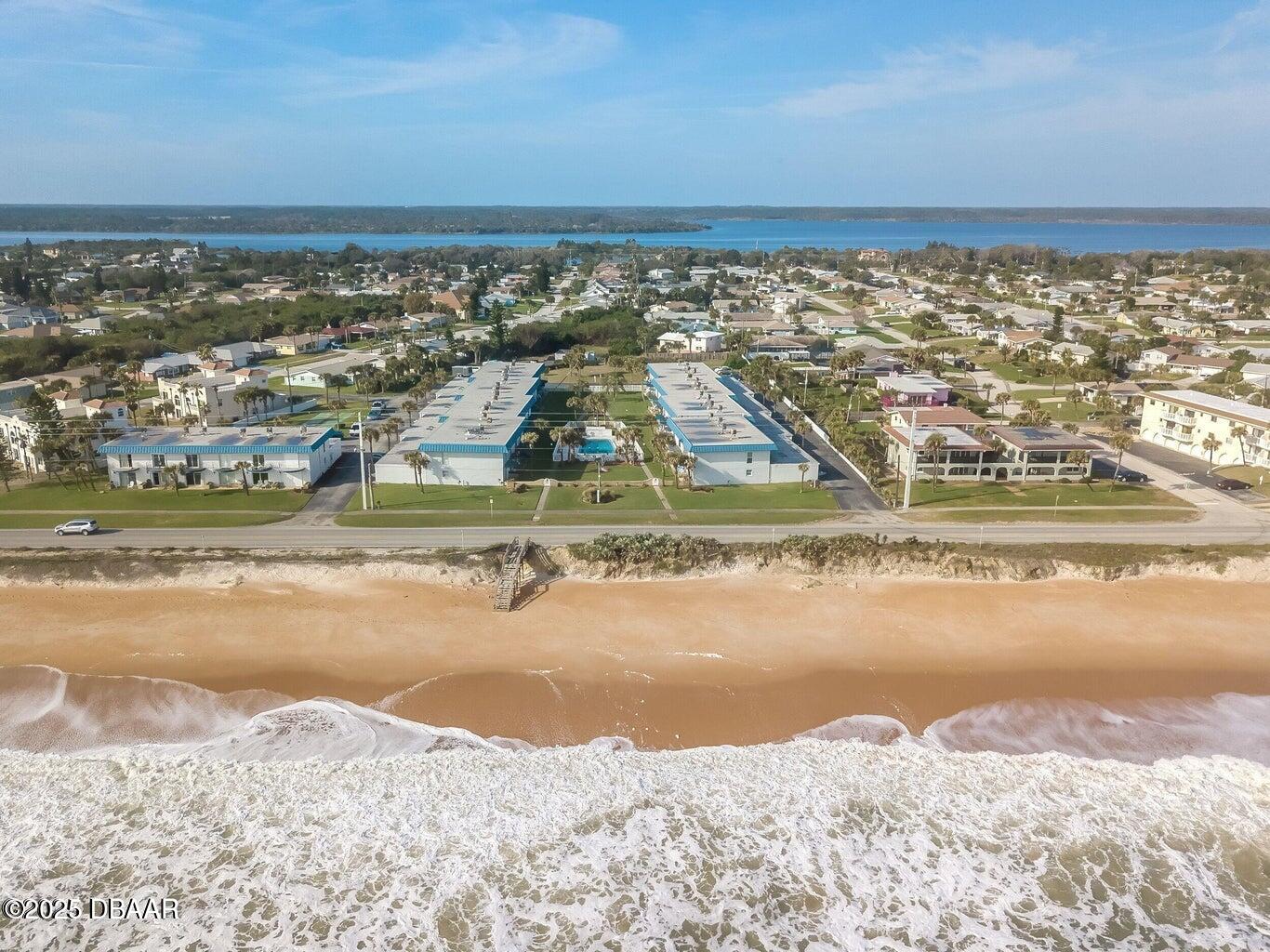 2750 Ocean Shore Boulevard, Unit 19 Ormond Beach, FL 32176 - Photo 21 of 23 a view of an ocean and beach