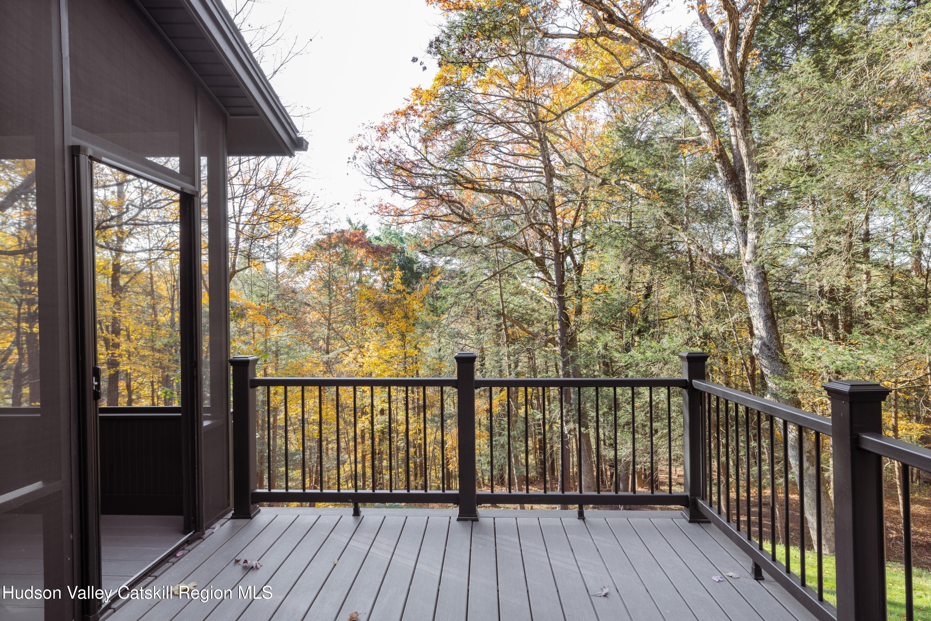 8 Watch Hill Road New Paltz, NY 12561 - Photo 13 of 30 a view of balcony with wooden floor and fence