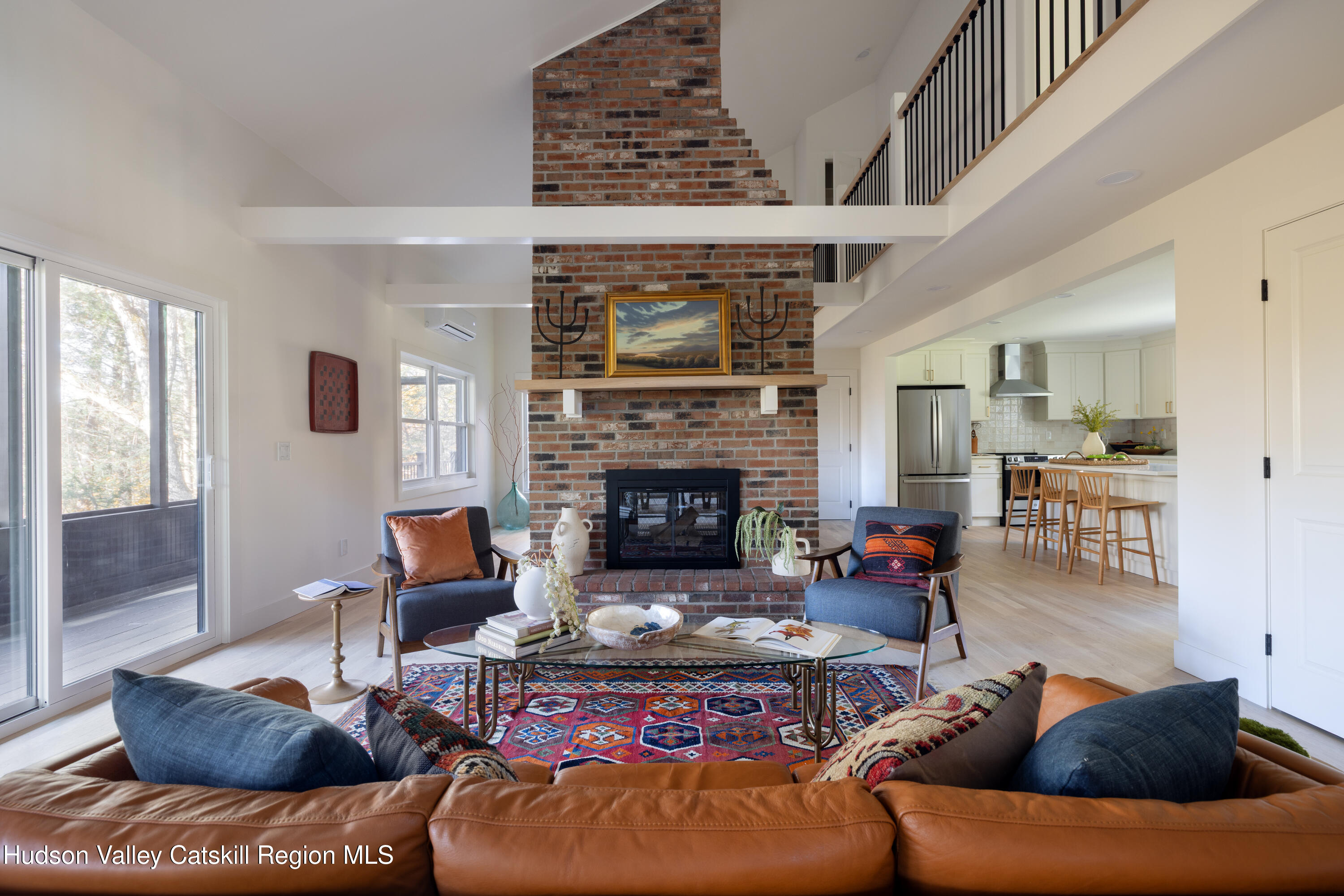 8 Watch Hill Road New Paltz, NY 12561 - Photo 3 of 30 a living room with furniture and a fireplace