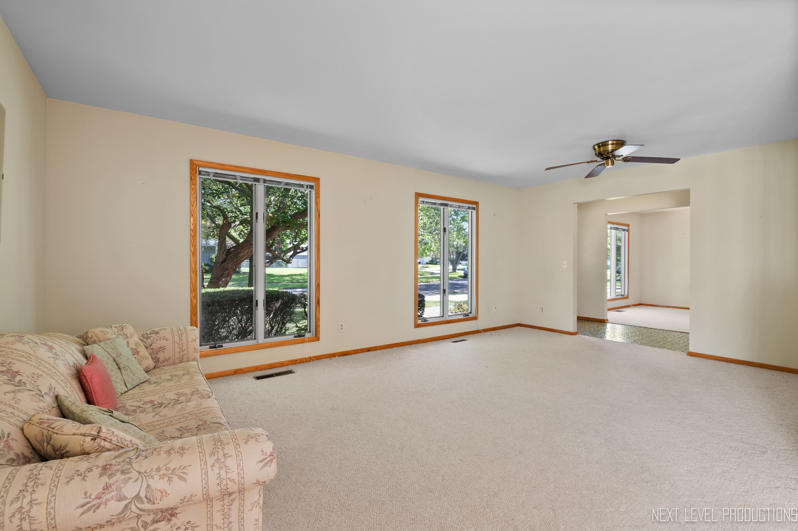 38 Sherwick Road Oswego, IL 60543 - Photo 11 of 25 a view of a livingroom with furniture and windows