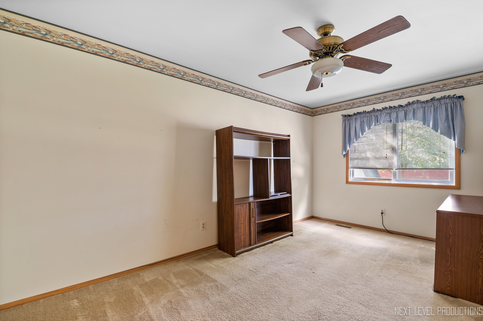 38 Sherwick Road Oswego, IL 60543 - Photo 17 of 25 a view of an empty room with a window