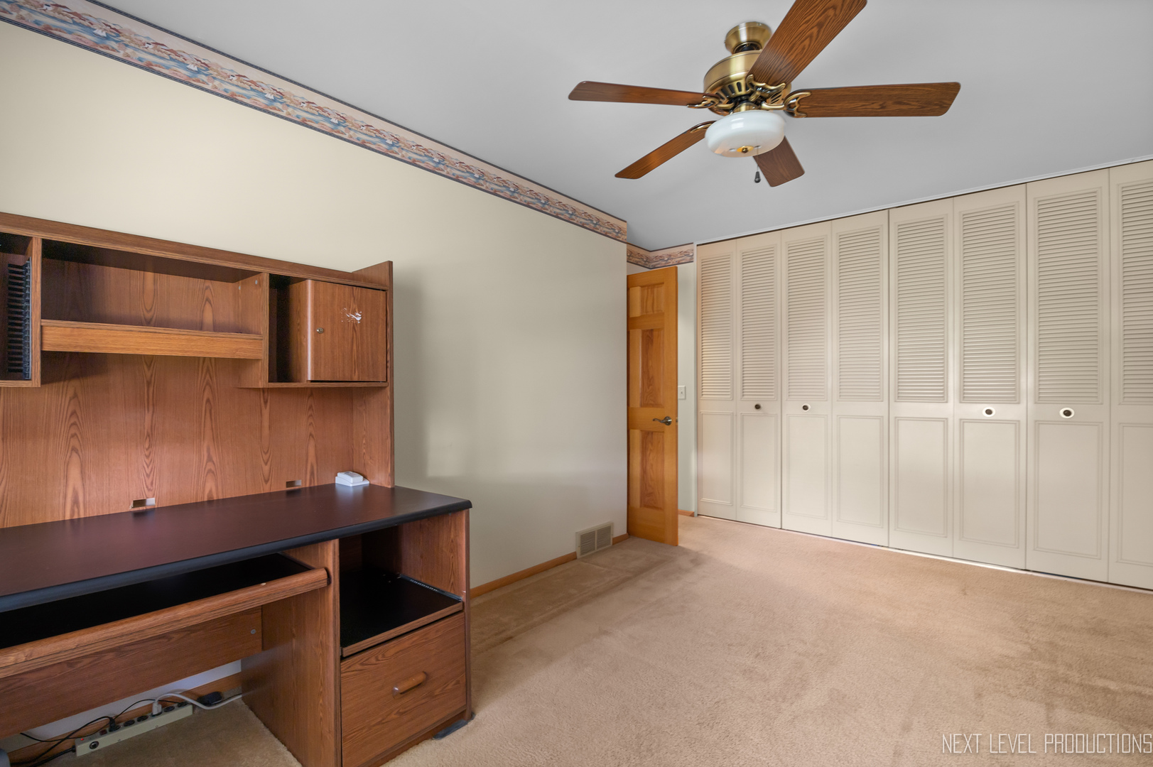 38 Sherwick Road Oswego, IL 60543 - Photo 18 of 25 a view of room with a ceiling fan