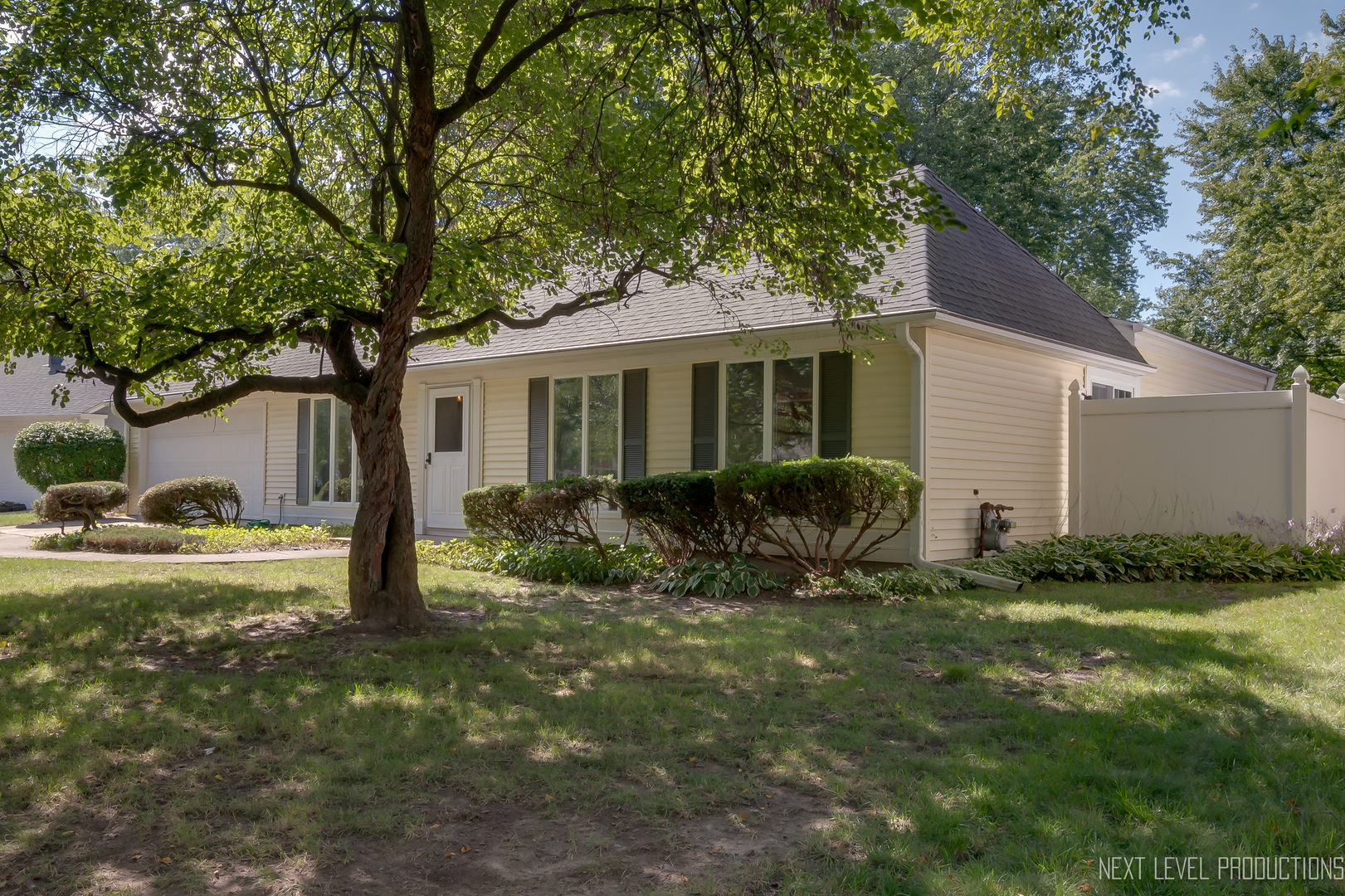 38 Sherwick Road Oswego, IL 60543 - Photo 2 of 25 a view of a house with a yard