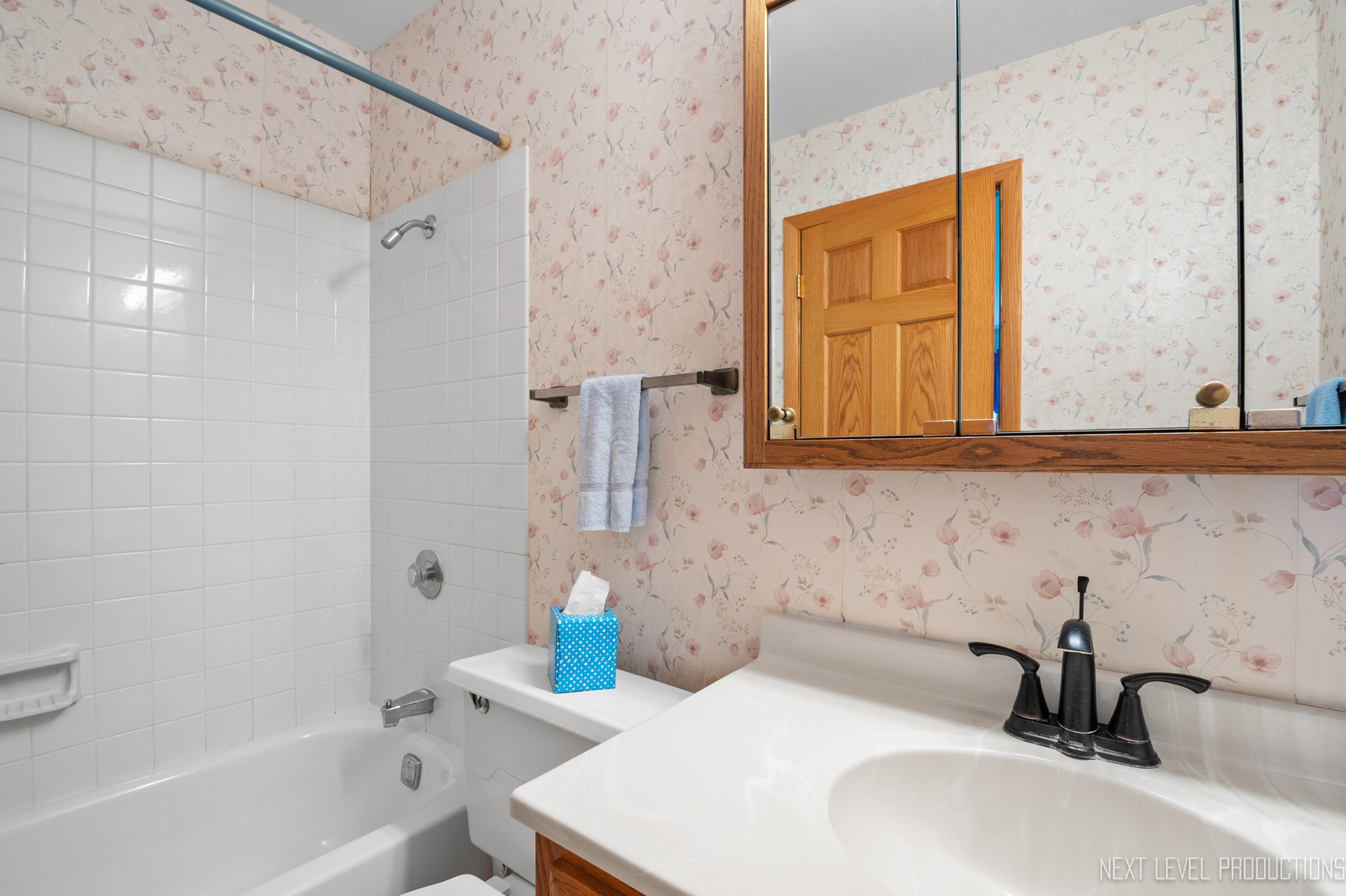 38 Sherwick Road Oswego, IL 60543 - Photo 23 of 25 a bathroom with a sink and a tub