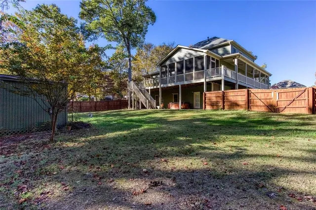 a view of a trees in a yard with large trees