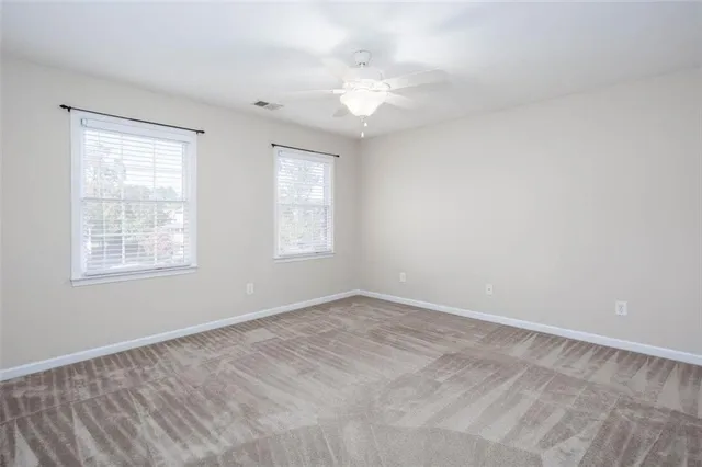 a view of a room with wooden walls