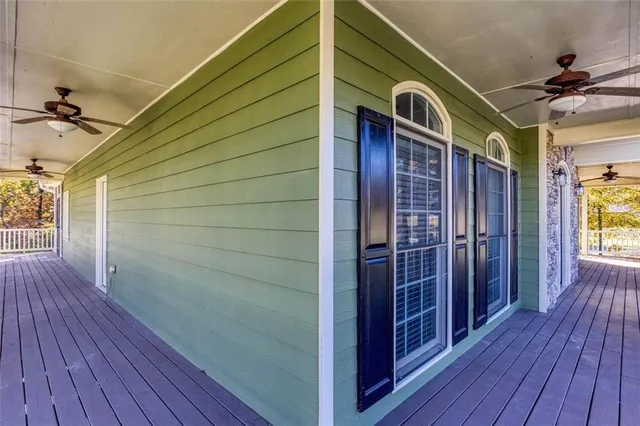 a view of a wooden deck with a bench