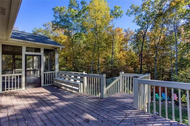 a view of a balcony with wooden floor