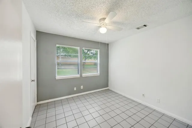 a view of an empty room with window