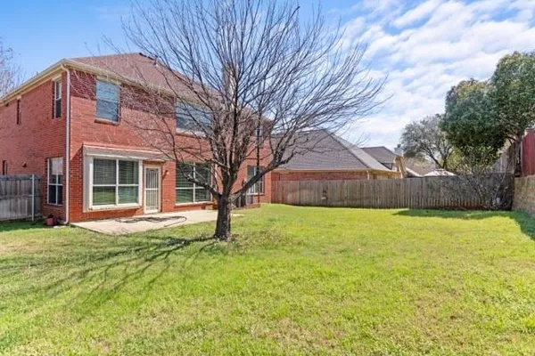 a house view with a garden space
