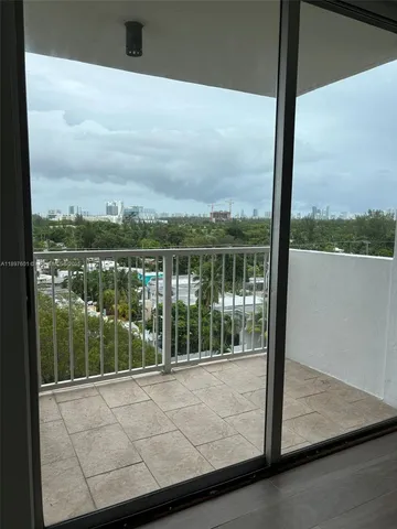 a view of a balcony with lake view