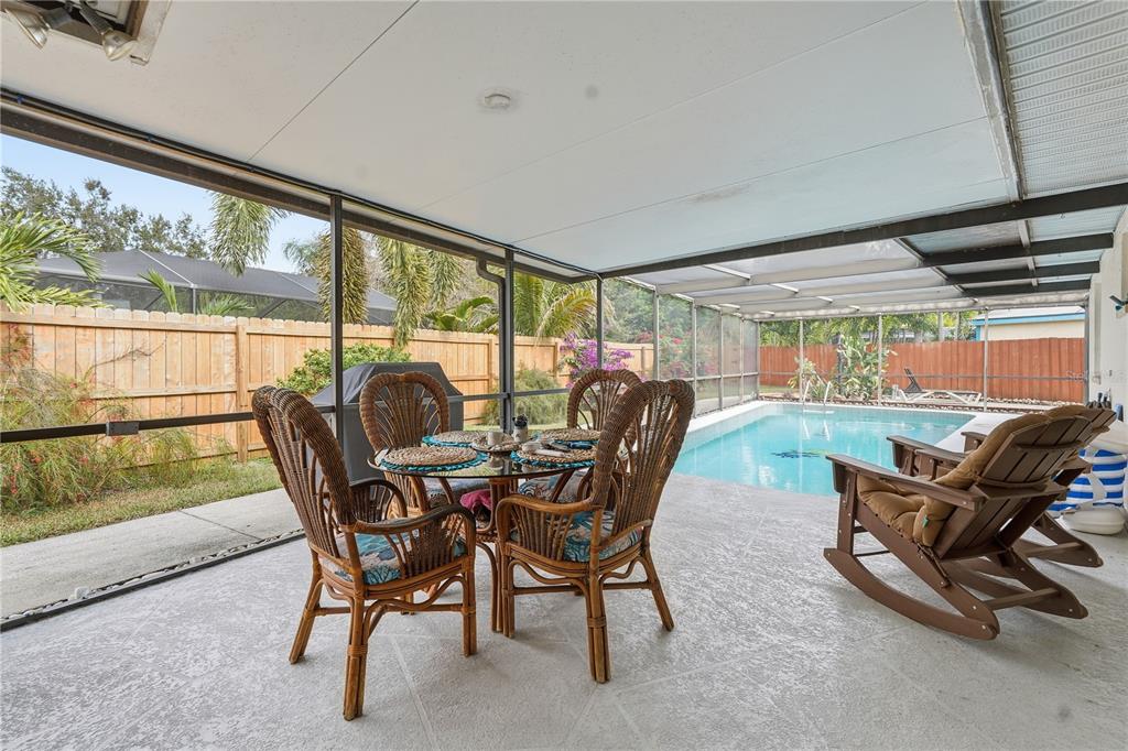 2370 Robyn Court Dunedin, FL 34698 - Photo 21 of 29 a view of a dining room with furniture window and outside view
