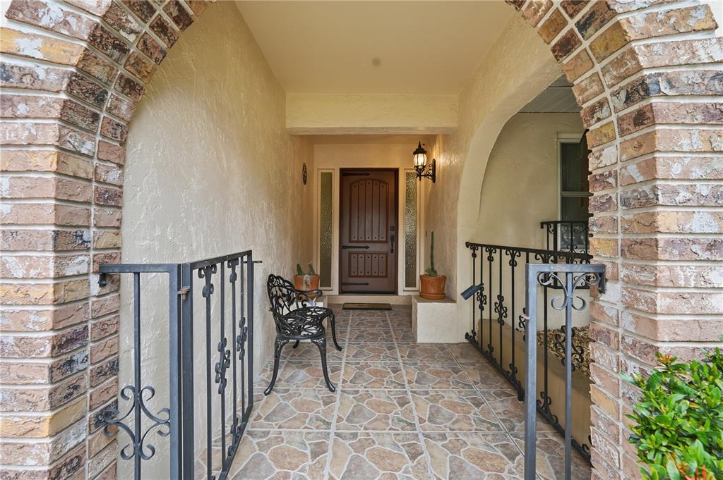 2370 Robyn Court Dunedin, FL 34698 - Photo 3 of 29 a view of entryway with wooden floor