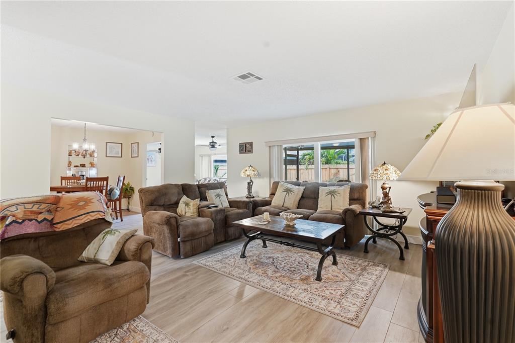 2370 Robyn Court Dunedin, FL 34698 - Photo 4 of 29 a living room with furniture and a window