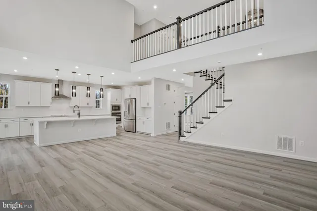 a bathroom with a sink a toilet and a bathtub