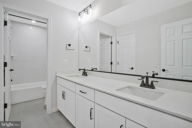 a view of an empty room with stairs