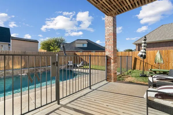 a view of a backyard with a garden