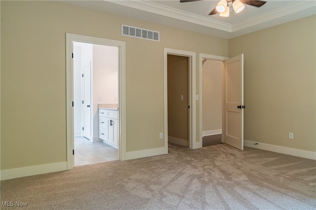 5183 Boneta Road Medina, OH 44256 - Photo 15 of 31 First Floor Primary Bedroom with Walk-in Closet