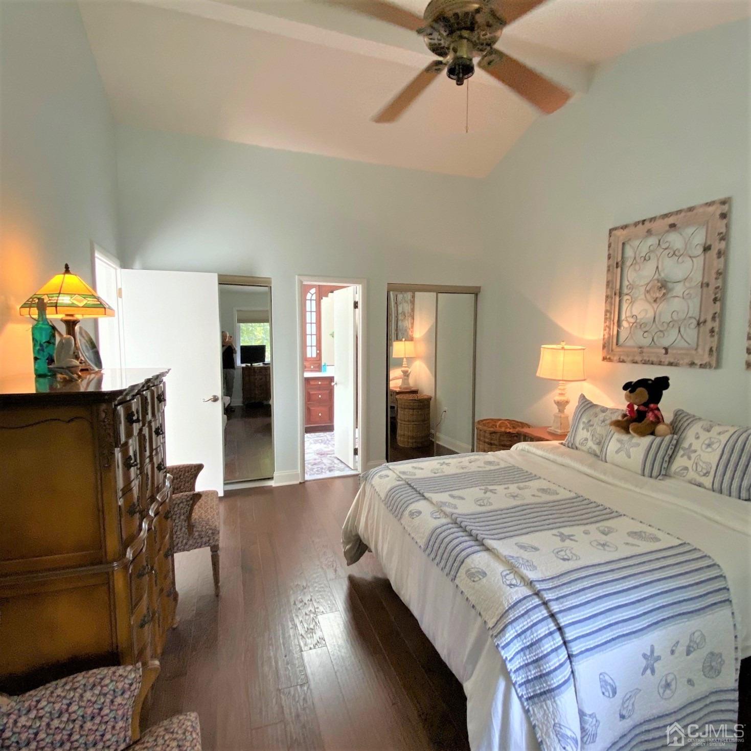 5 Timan Place Piscataway, NJ 08854 - Photo 14 of 27 a bed room with a bed and a chandelier