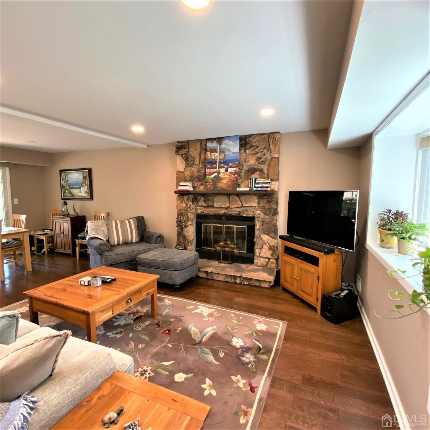 5 Timan Place Piscataway, NJ 08854 - Photo 19 of 27 a living room with furniture and a flat screen tv