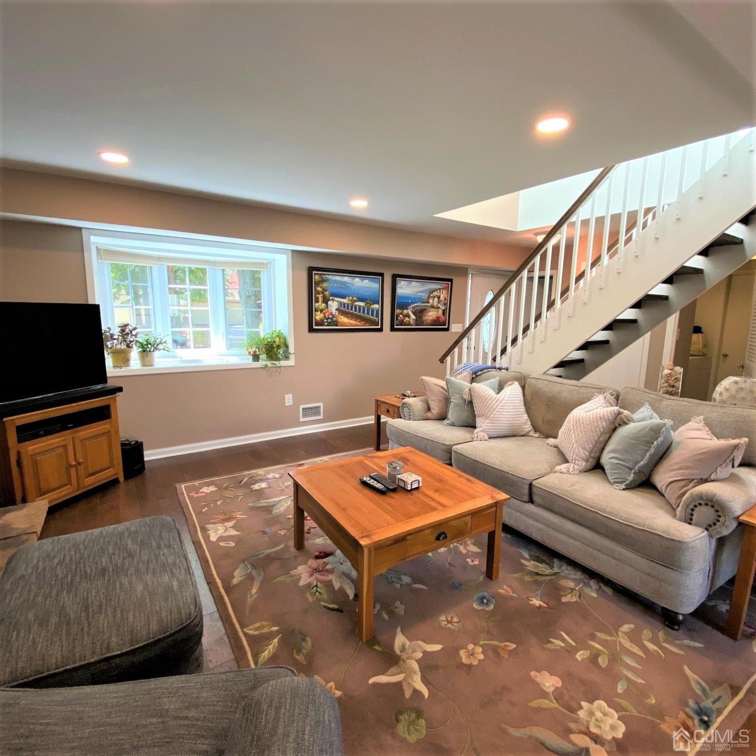 5 Timan Place Piscataway, NJ 08854 - Photo 20 of 27 a living room with furniture and a flat screen tv