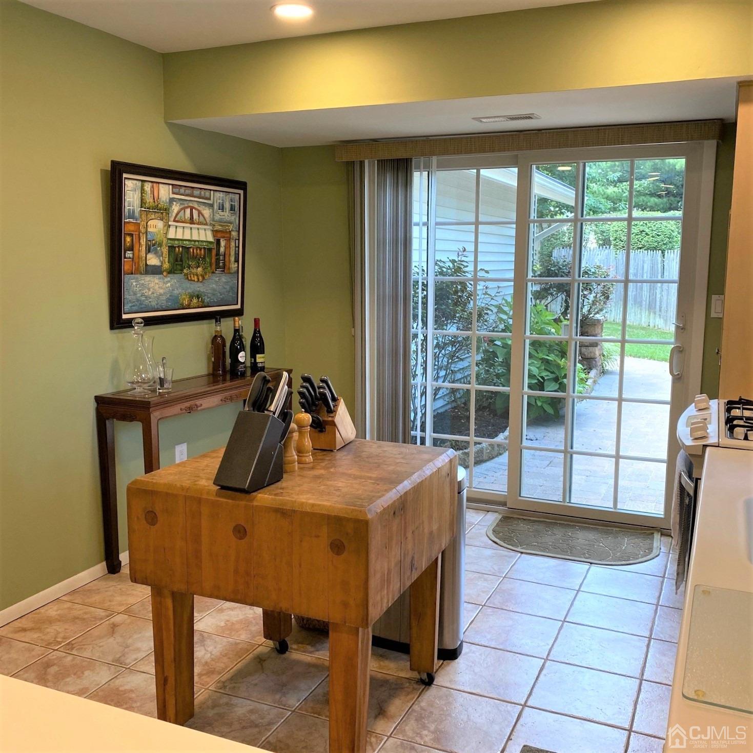 5 Timan Place Piscataway, NJ 08854 - Photo 23 of 27 a view of a dining room with furniture window and outside view