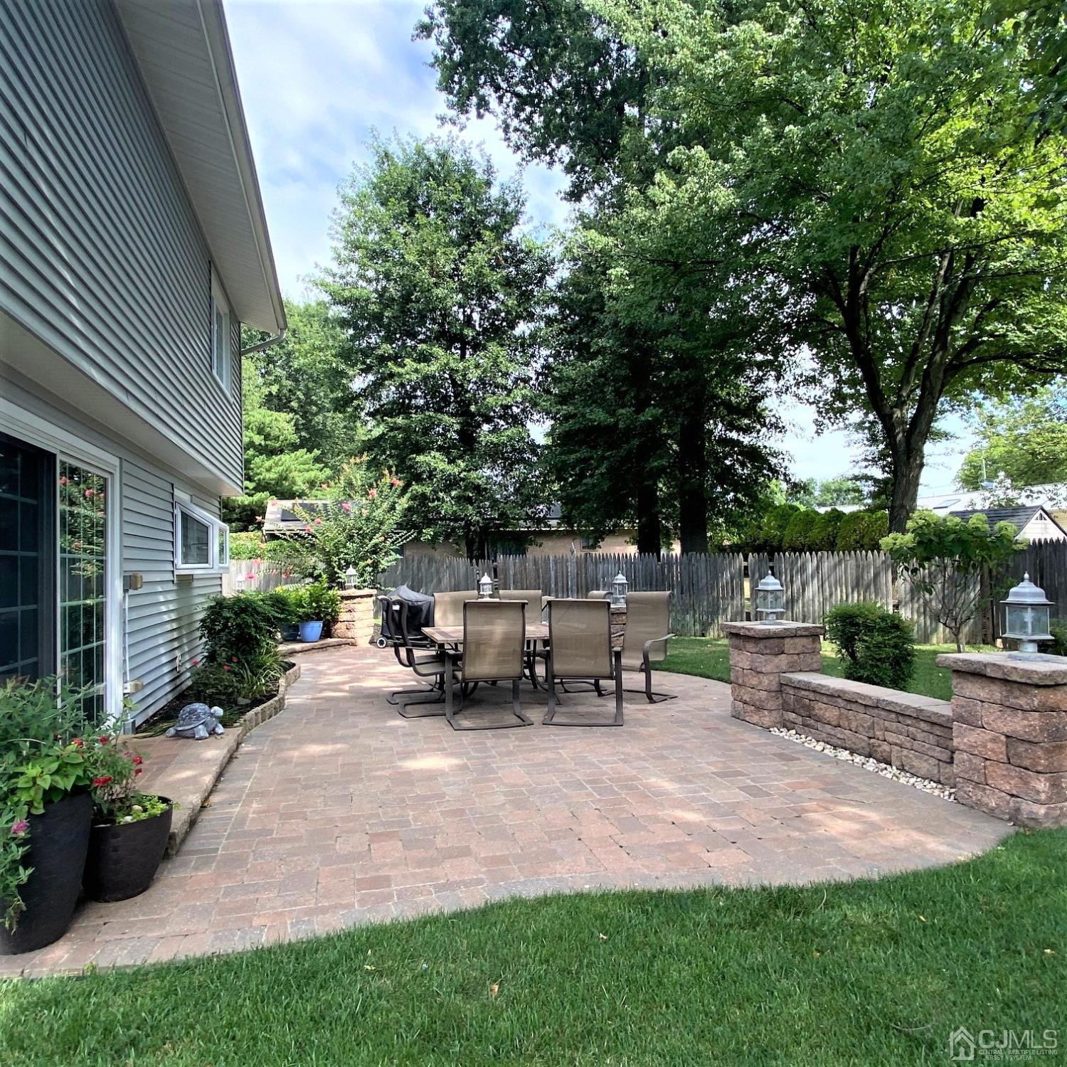 5 Timan Place Piscataway, NJ 08854 - Photo 5 of 27 a view of backyard with sitting area and garden