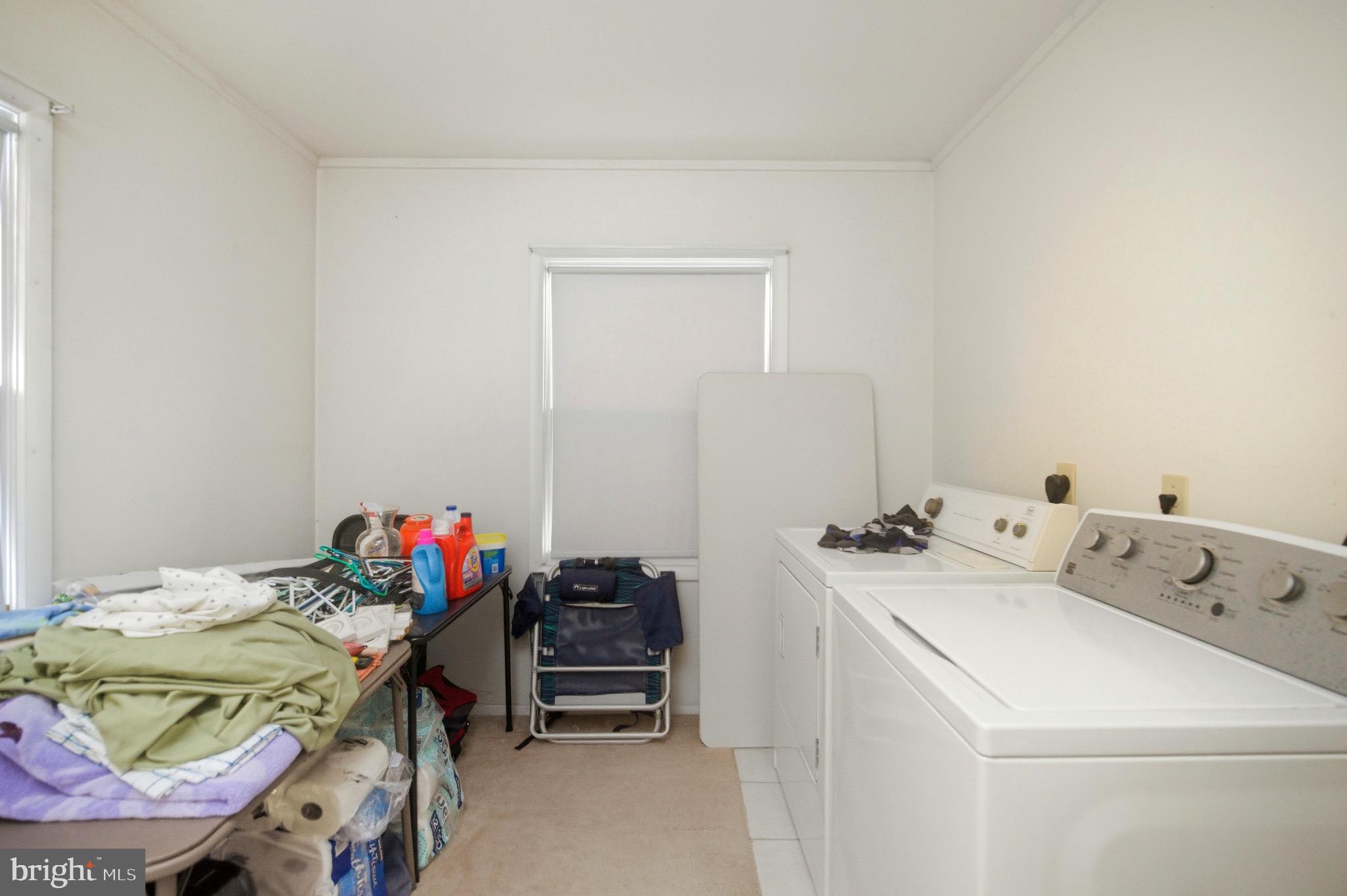 14 Buttercup Lane Willingboro, NJ 08046 - Photo 12 of 26 a utility room with dryer and washer