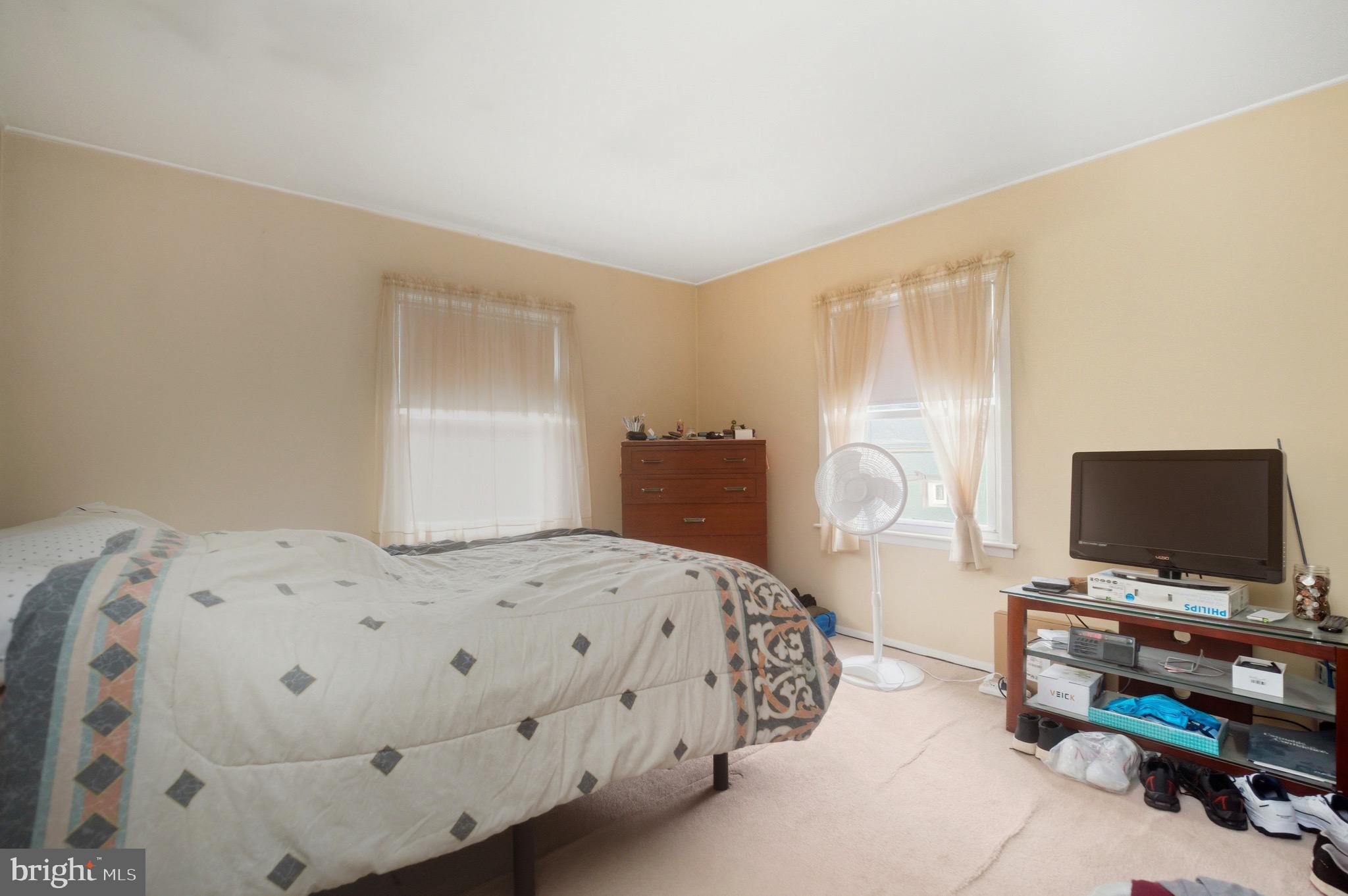 14 Buttercup Lane Willingboro, NJ 08046 - Photo 14 of 26 a bedroom with a bed and flat screen tv