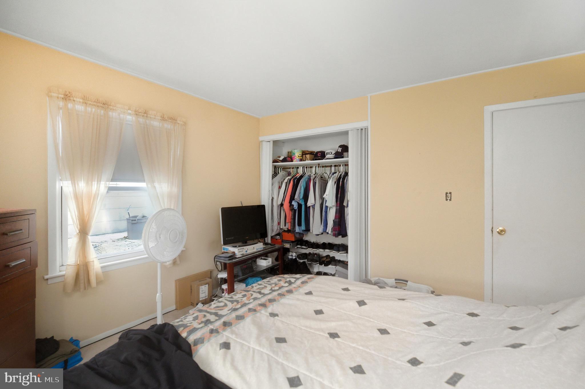 14 Buttercup Lane Willingboro, NJ 08046 - Photo 16 of 26 a bedroom with a bed and a window