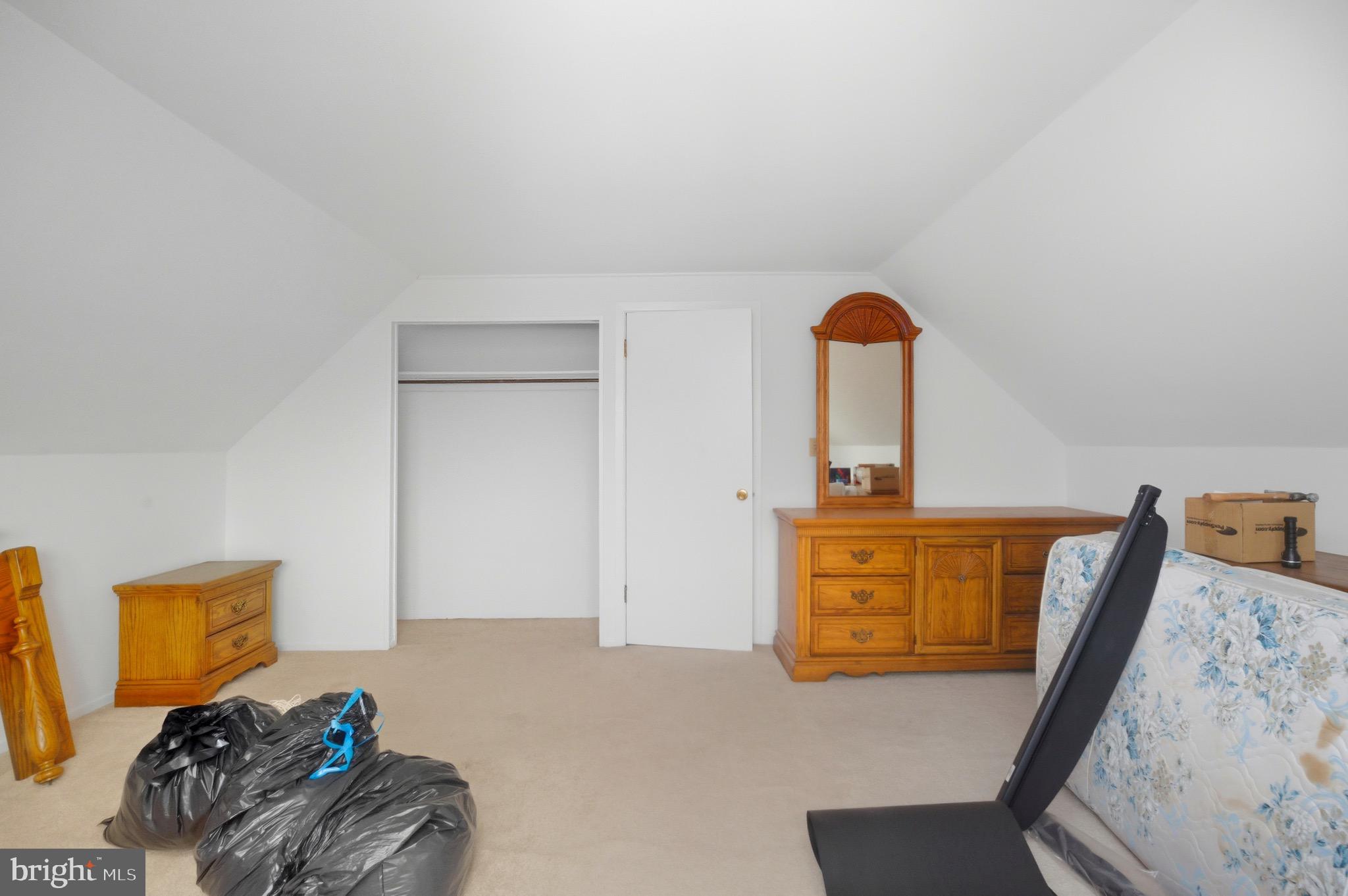 14 Buttercup Lane Willingboro, NJ 08046 - Photo 21 of 26 a bed room with a bed and a dresser