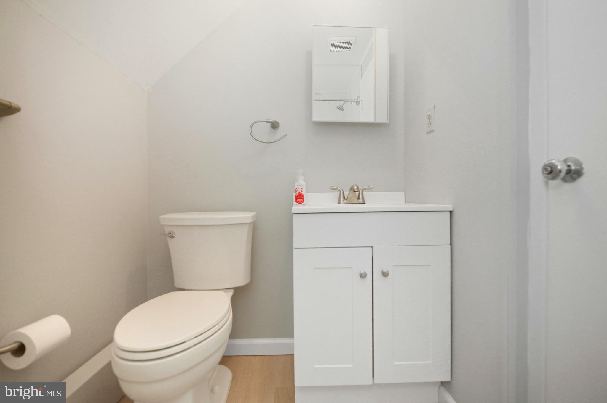 14 Buttercup Lane Willingboro, NJ 08046 - Photo 26 of 26 a white toilet sitting next to a bathroom sink