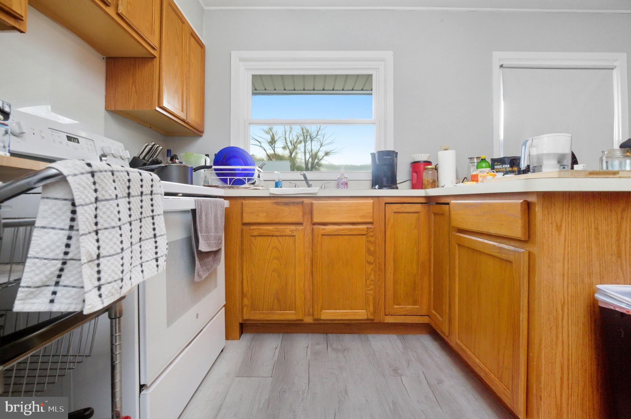 14 Buttercup Lane Willingboro, NJ 08046 - Photo 6 of 26 a kitchen with stainless steel appliances a sink and a refrigerator