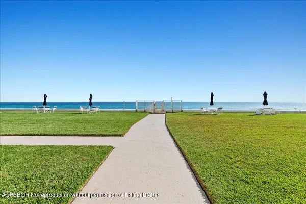 a living room with furniture and flat screen tv