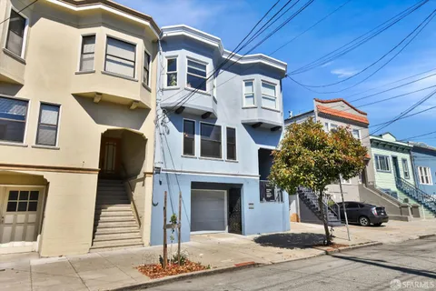 a front view of a multi story residential apartment building
