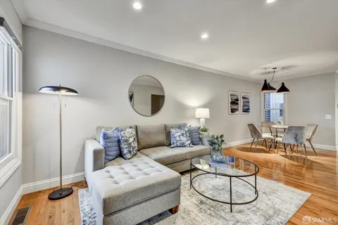 a bathroom with a sink double vanity and a mirror