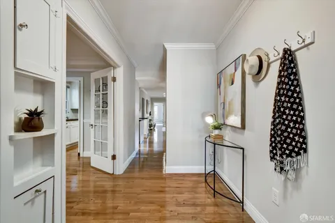 a living room with furniture rug and window