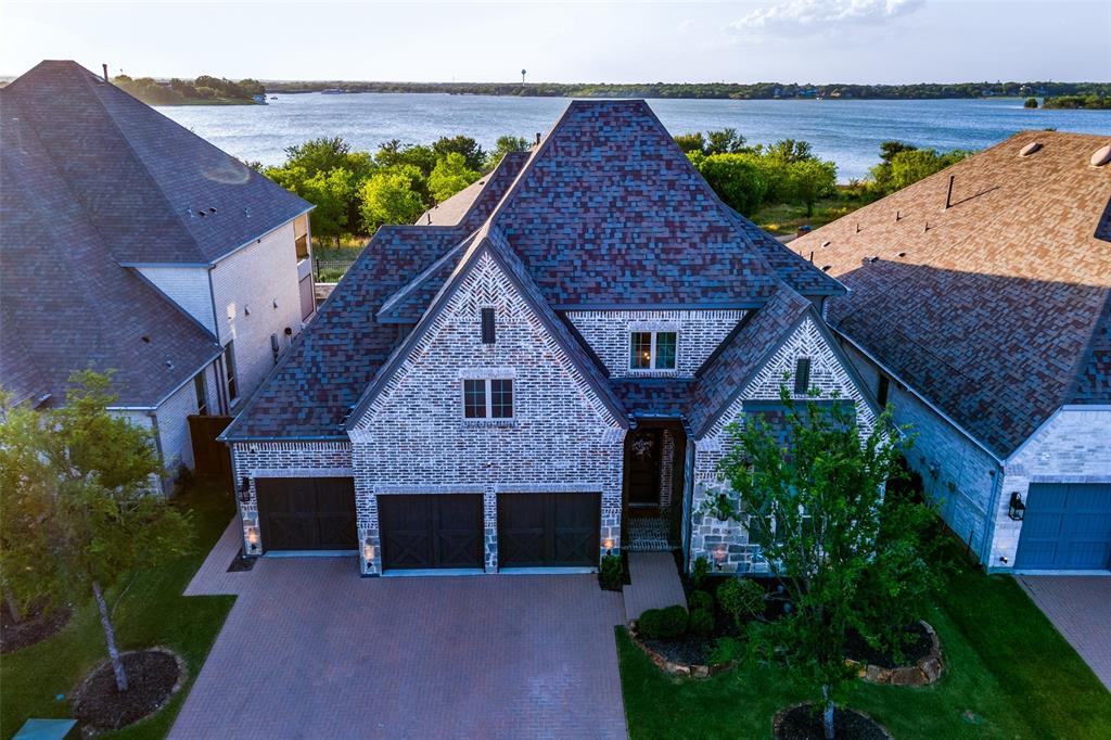 8280 Western The Colony, TX 75056 - Photo 1 of 1 a aerial view of a house with a yard and potted plants