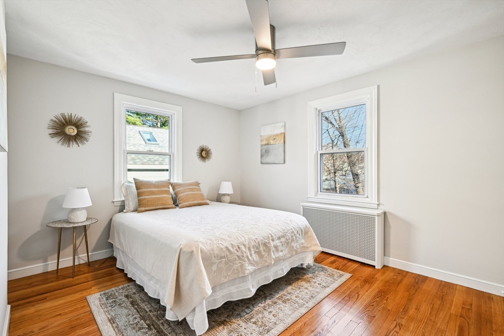 49 Dellwood Road Worcester, MA 01602 - Photo 16 of 27 a bedroom with a large bed and a window