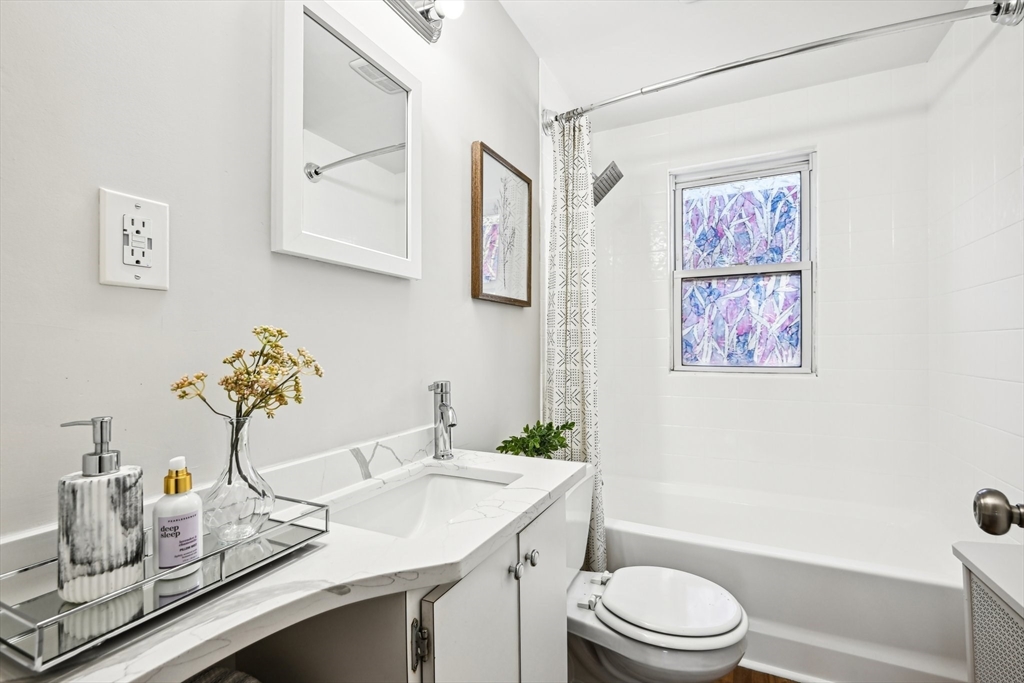 49 Dellwood Road Worcester, MA 01602 - Photo 18 of 27 a bathroom with a sink a toilet and shower