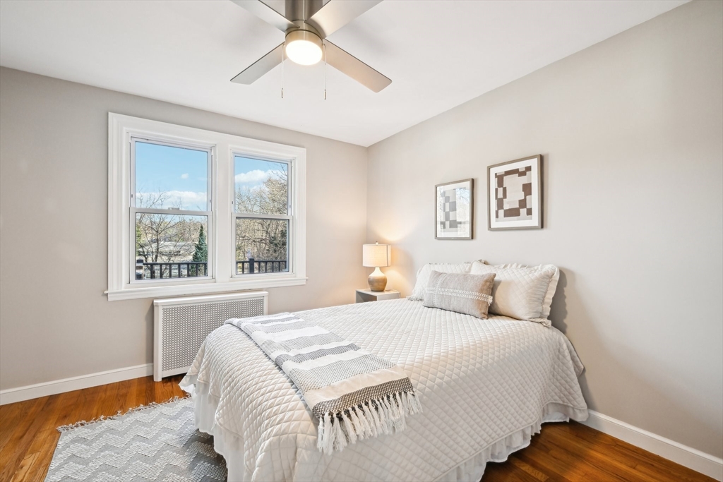 49 Dellwood Road Worcester, MA 01602 - Photo 19 of 27 a bedroom with a large bed and a window